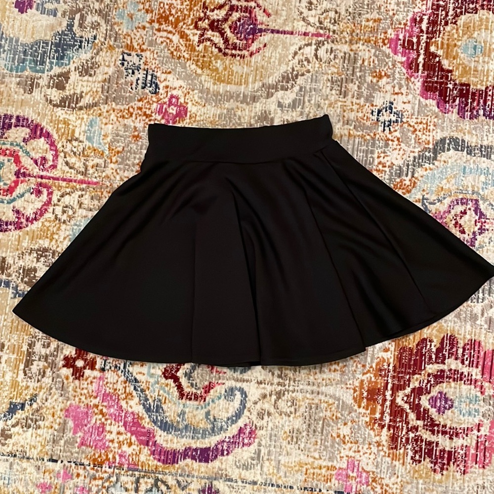 Black, short skater skirt. Size Juniors small.